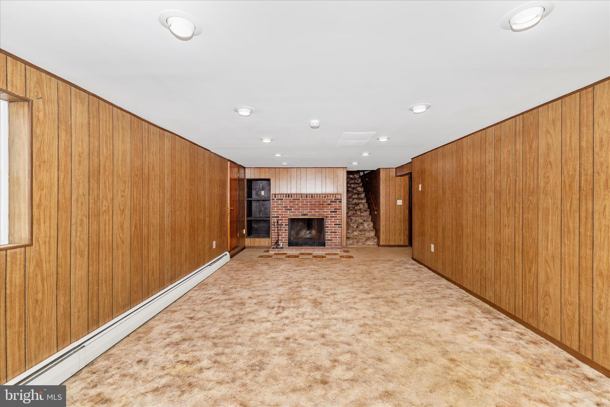 10223 Liberty Road Frederick, MD 21701 - Photo 32 of 51 Lower Level Family Room with Cozy Fireplace