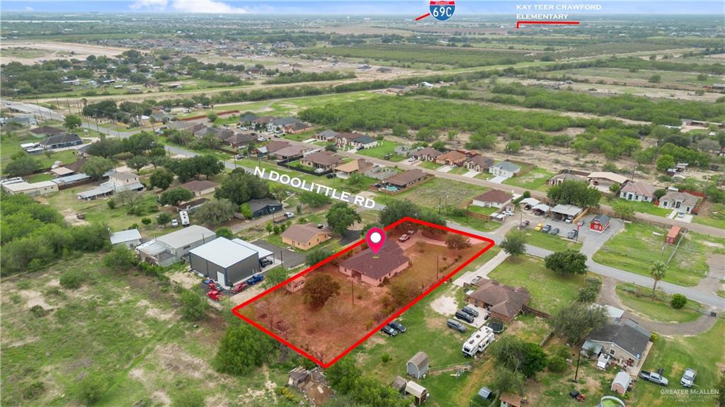 6020 North Doolittle Road Edinburg, TX 78542 - Photo 20 of 23 Aerial perspective showcasing a residential property with a single-story home