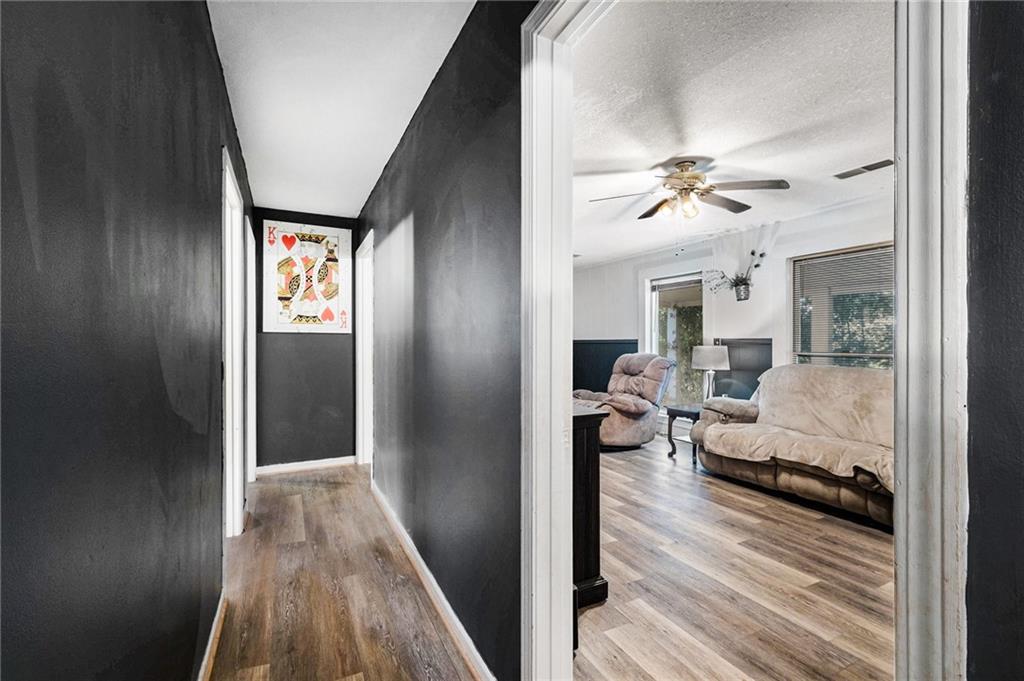 5831 Mize Road Toccoa, GA 30577 - Photo 12 of 28 a living room with furniture and a wooden floor