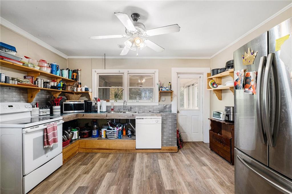 5831 Mize Road Toccoa, GA 30577 - Photo 14 of 28 a kitchen with stainless steel appliances granite countertop a refrigerator and a stove