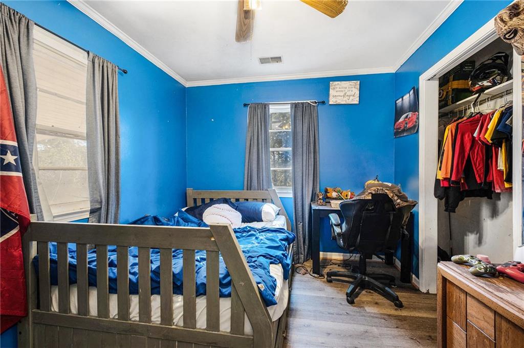 5831 Mize Road Toccoa, GA 30577 - Photo 10 of 28 a view of walk in closet with clothes and shoes