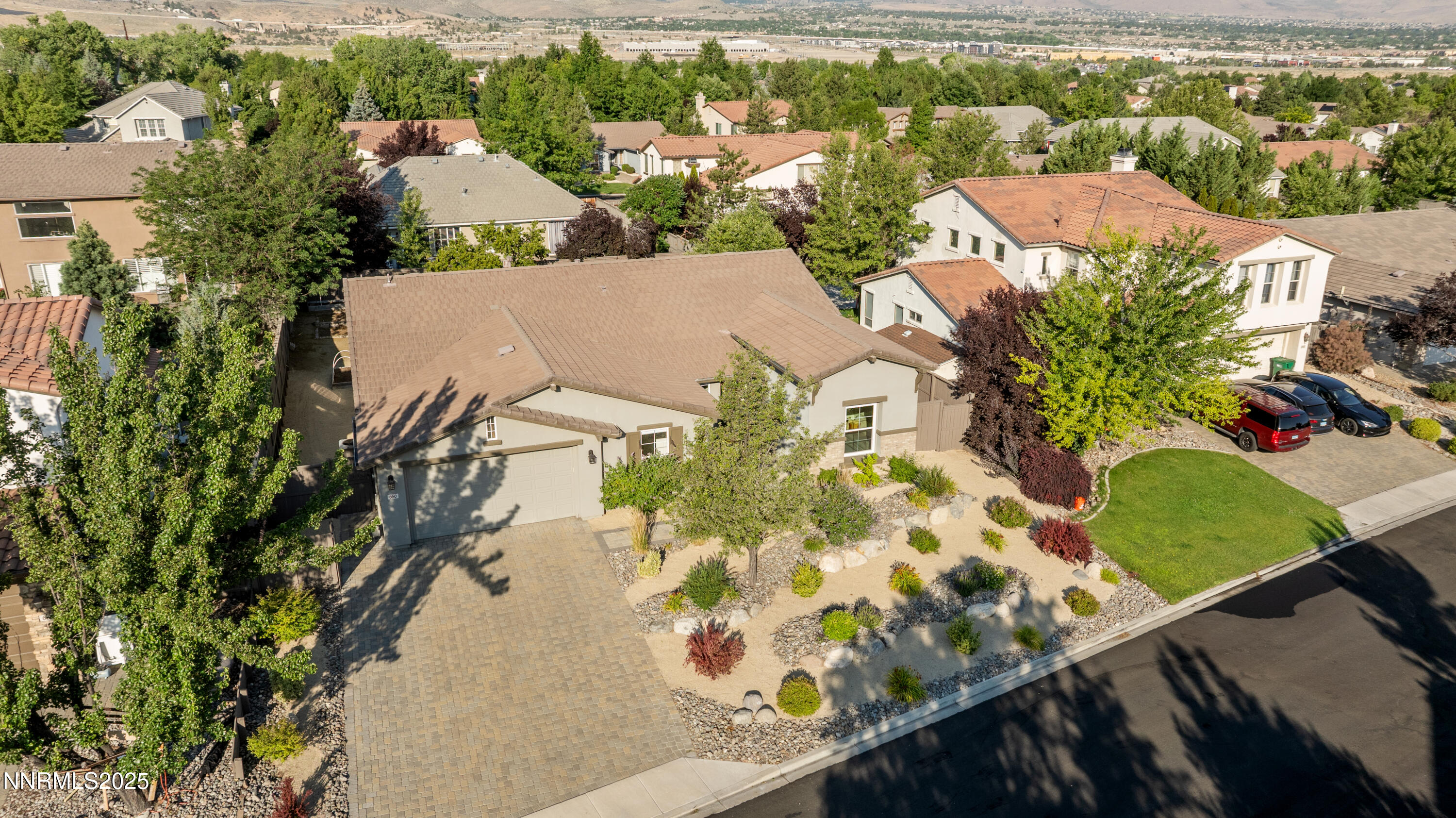 650 Caspian Court Reno, NV 89521 - Photo 4 of 40 an aerial view of residential houses with outdoor space and parking