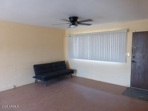 303 Greenwich Road Kearny, AZ 85137 - Photo 7 of 18 a living room with furniture and a ceiling fan