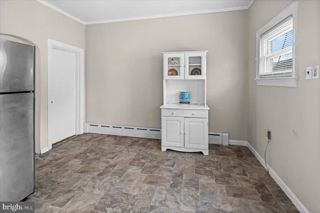 a view of an empty room and window