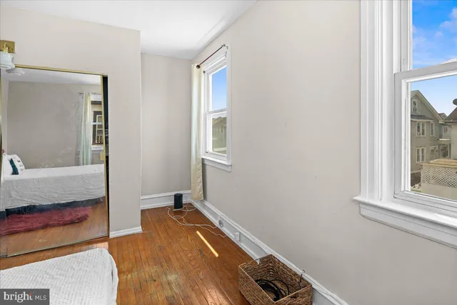 a room with a bed and a window