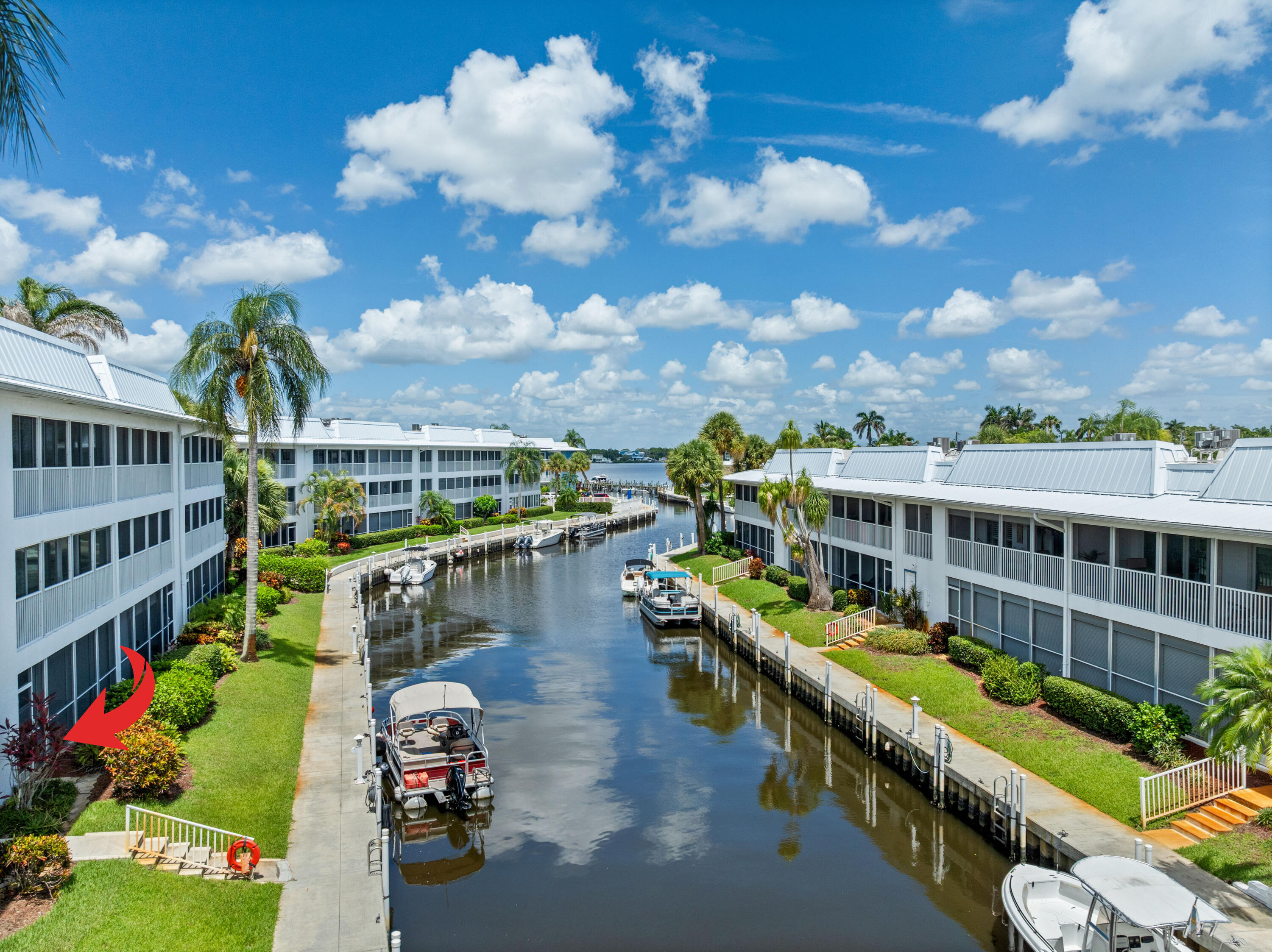 1864 Southwest Palm City Road, Unit 103 Stuart, FL 34994 - Photo 35 of 44 DJI_0977_Arrow