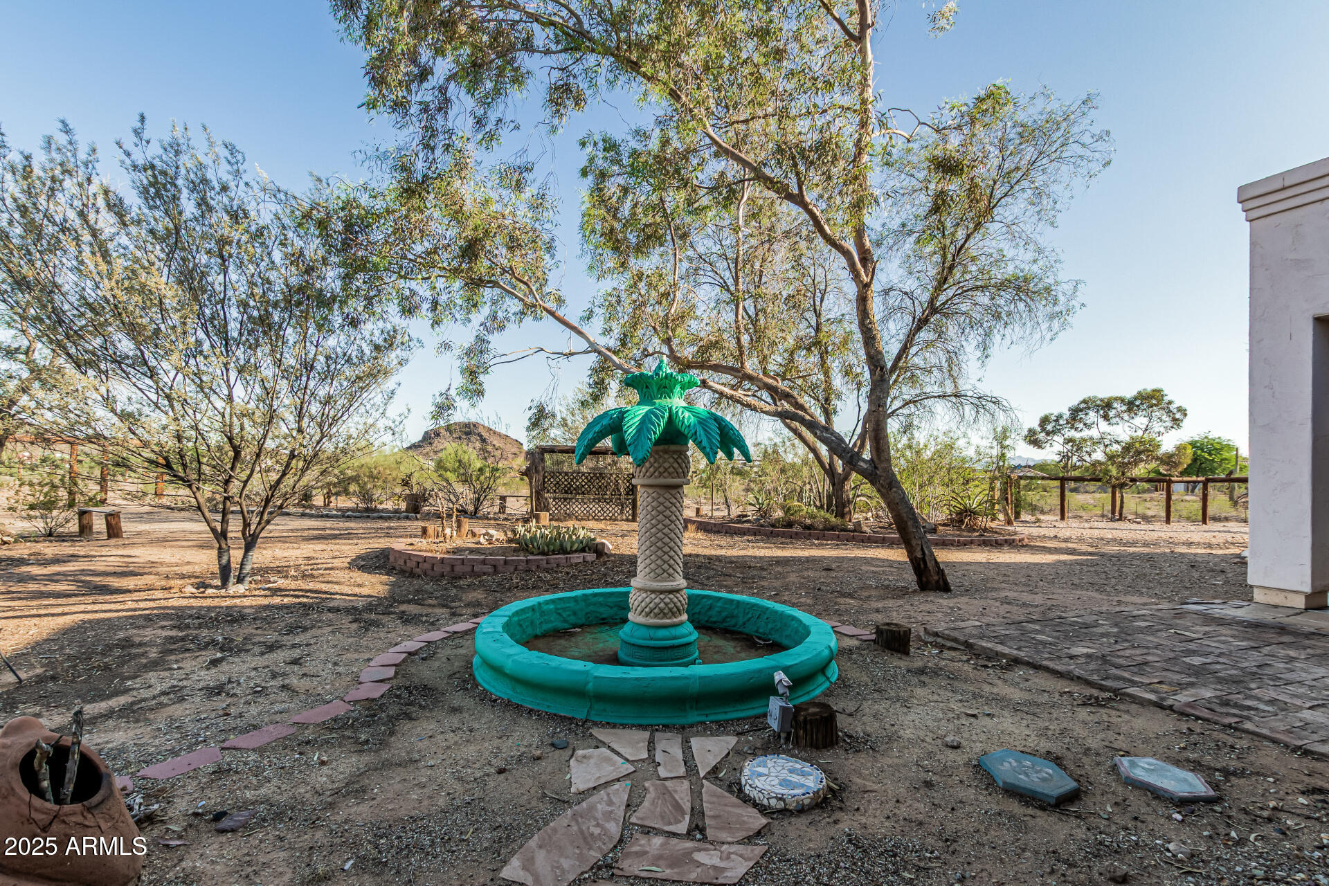 15639 West Peak View Road Surprise, AZ 85387 - Photo 111 of 131 a swimming pool with outdoor seating and trees