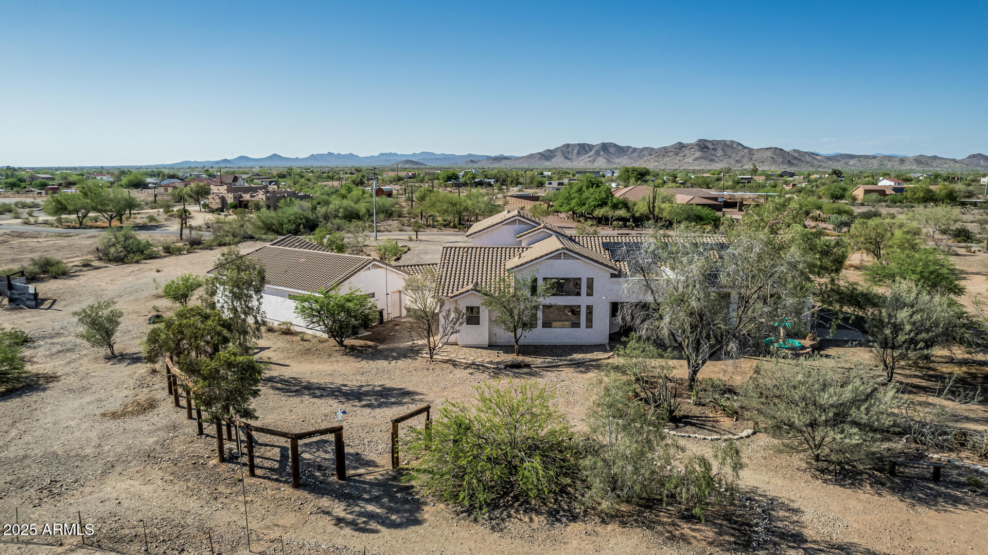 15639 West Peak View Road Surprise, AZ 85387 - Photo 125 of 131 an aerial view of a house with a yard and mountain view