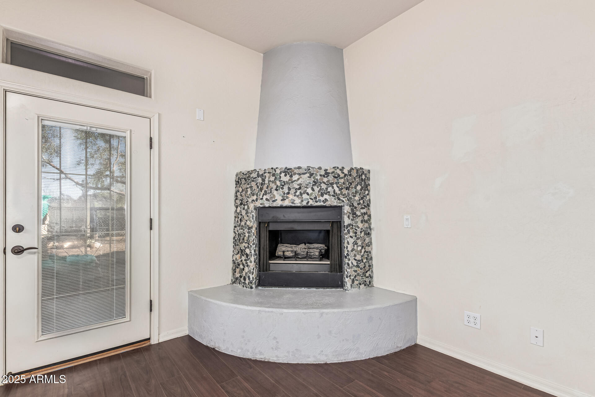 15639 West Peak View Road Surprise, AZ 85387 - Photo 43 of 131 Primary Bedroom Fireplace Detail