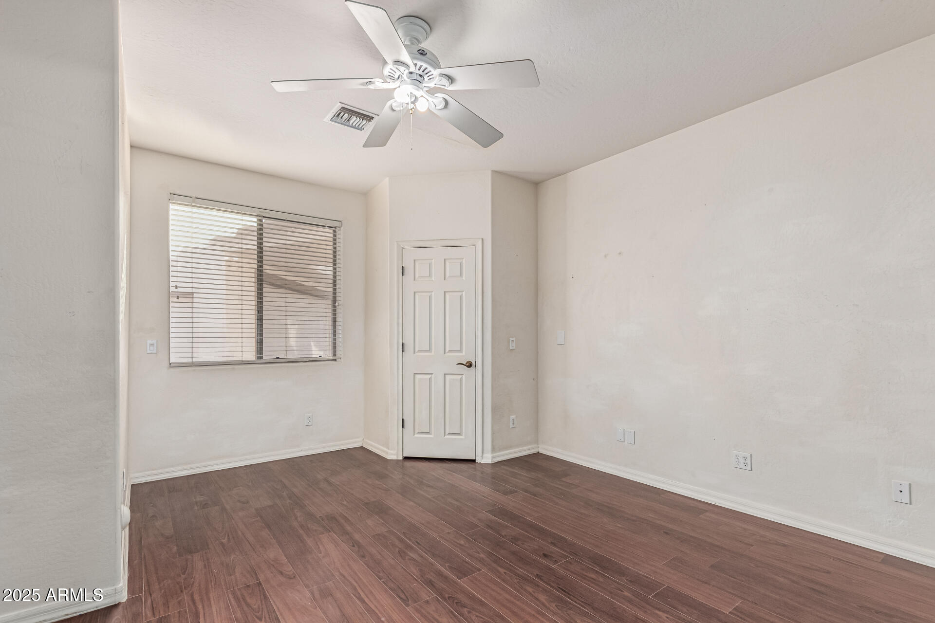 15639 West Peak View Road Surprise, AZ 85387 - Photo 52 of 131 wooden floor in an empty room with a window