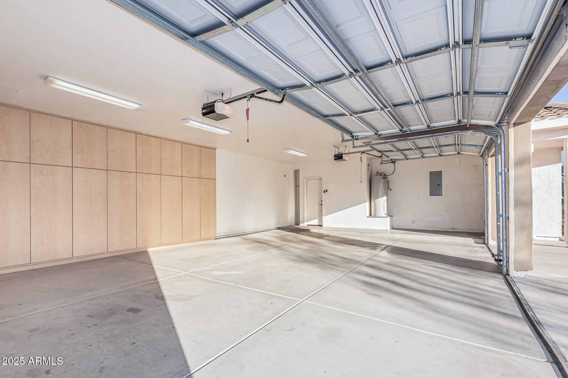 15639 West Peak View Road Surprise, AZ 85387 - Photo 90 of 131 a view of a hallway with a white walls