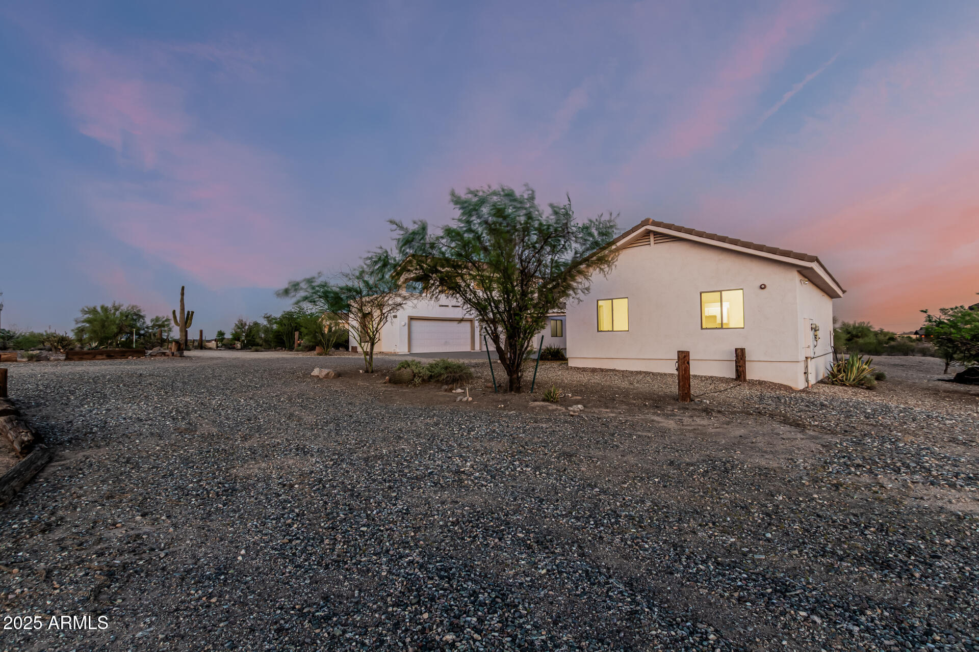 15639 West Peak View Road Surprise, AZ 85387 - Photo 9 of 131 Front Side Twilight