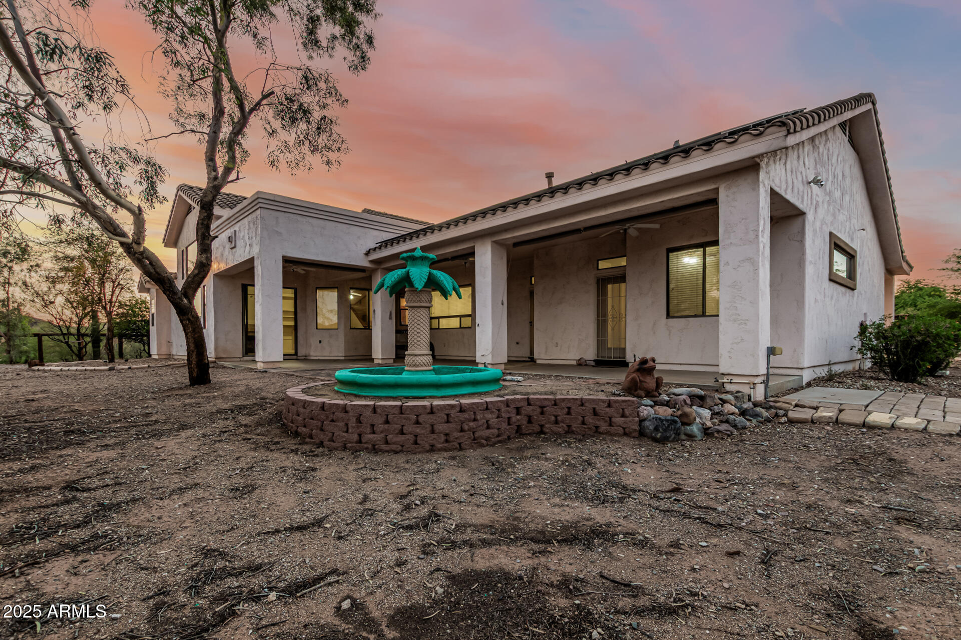 15639 West Peak View Road Surprise, AZ 85387 - Photo 94 of 131 Back Patio Twilight