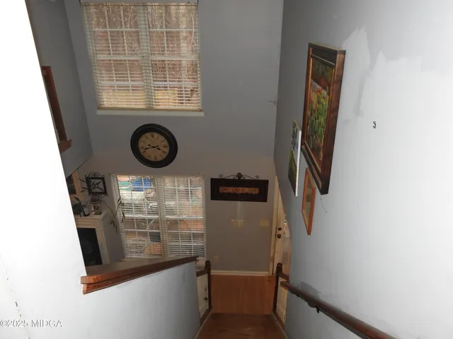 a view of entryway with washer and dryer