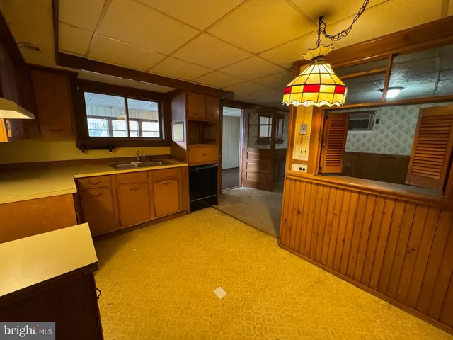 a view of a room with a chandelier