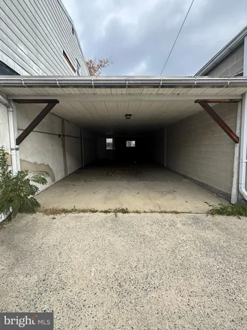 a view of a room with wooden walls and roof