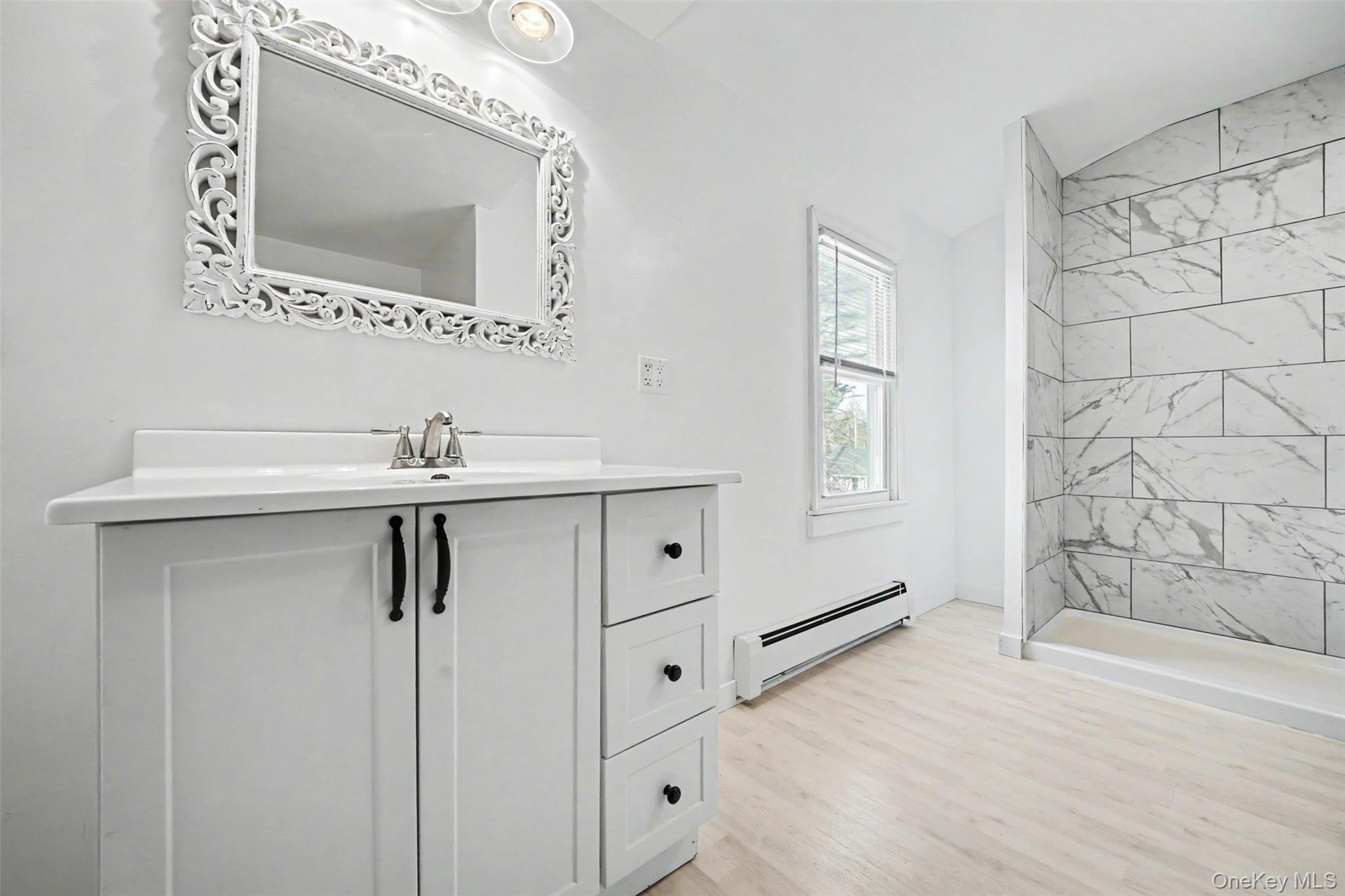 15 Forge Hill Road New Windsor, NY 12553 - Photo 6 of 21 The bathroom has been completely renovated.