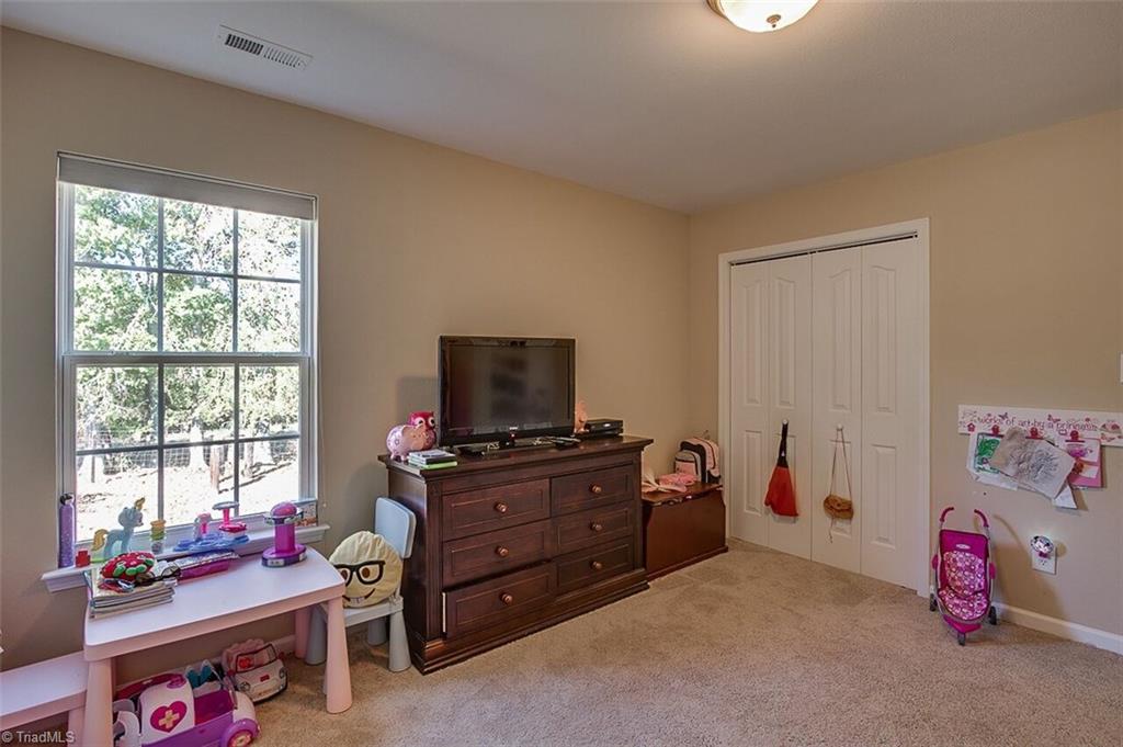 2169 Rindle Drive High Point, NC 27262 - Photo 24 of 30 Third upstairs bedroom is also roomy with lots of natural light.