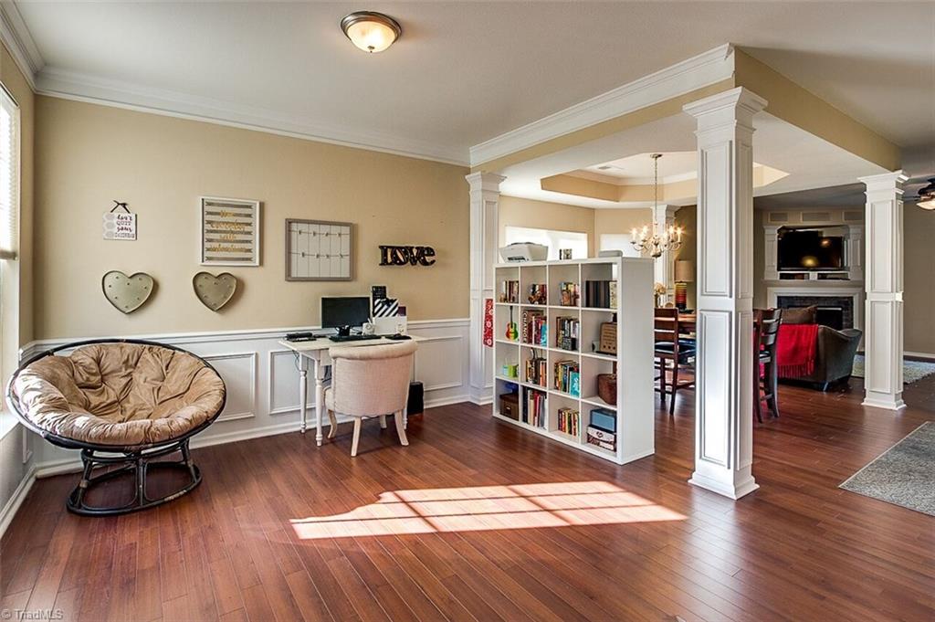 2169 Rindle Drive High Point, NC 27262 - Photo 29 of 30 Inviting and open floor plan features wainscoting throughout living room and formal dining room.