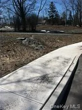 a view of road with yard