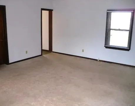 an empty room with a window