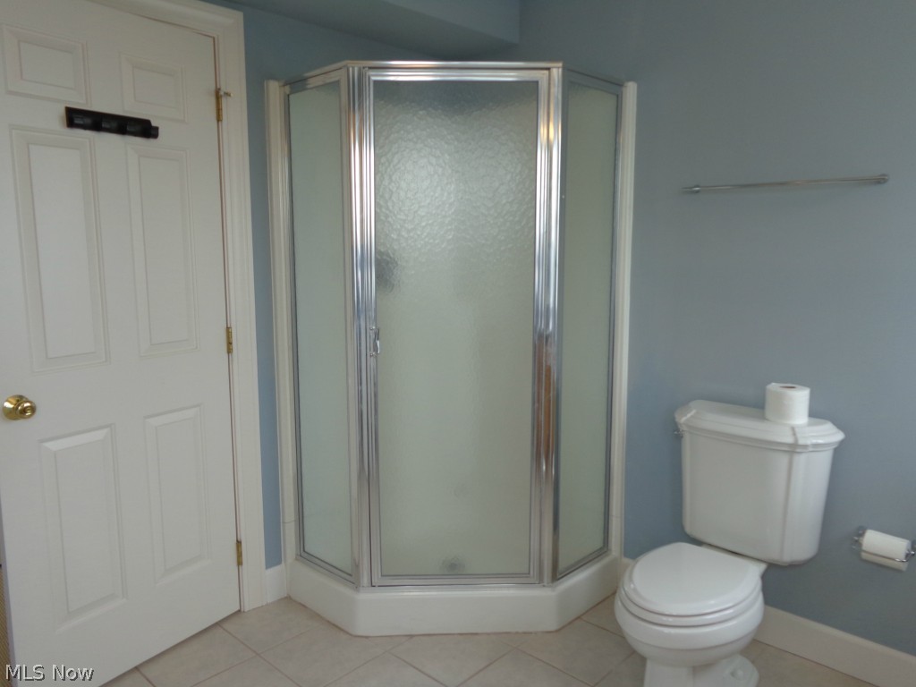 24 D Cedar Point Road Sandusky, OH 44870 - Photo 17 of 25 View #2 of the laundry room full bathroom combination on the second floor.