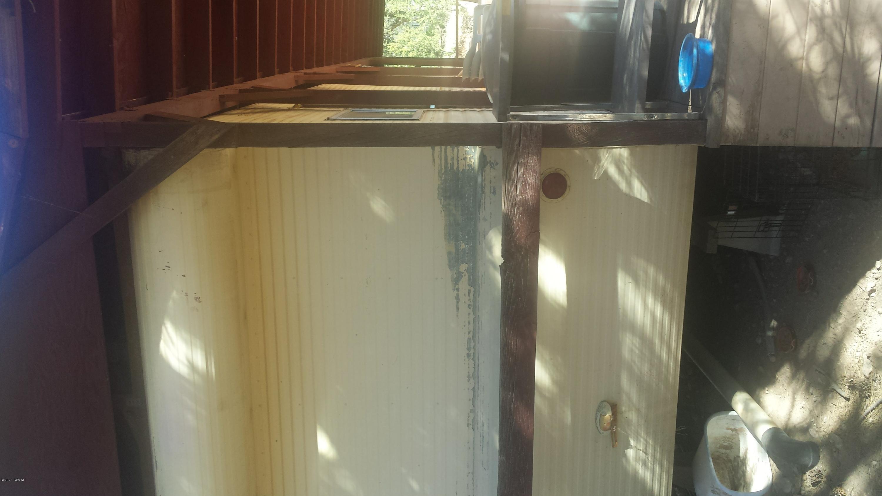 3554 Broken Arrow Road Overgaard, AZ 85933 - Photo 13 of 15 a close view of water heater