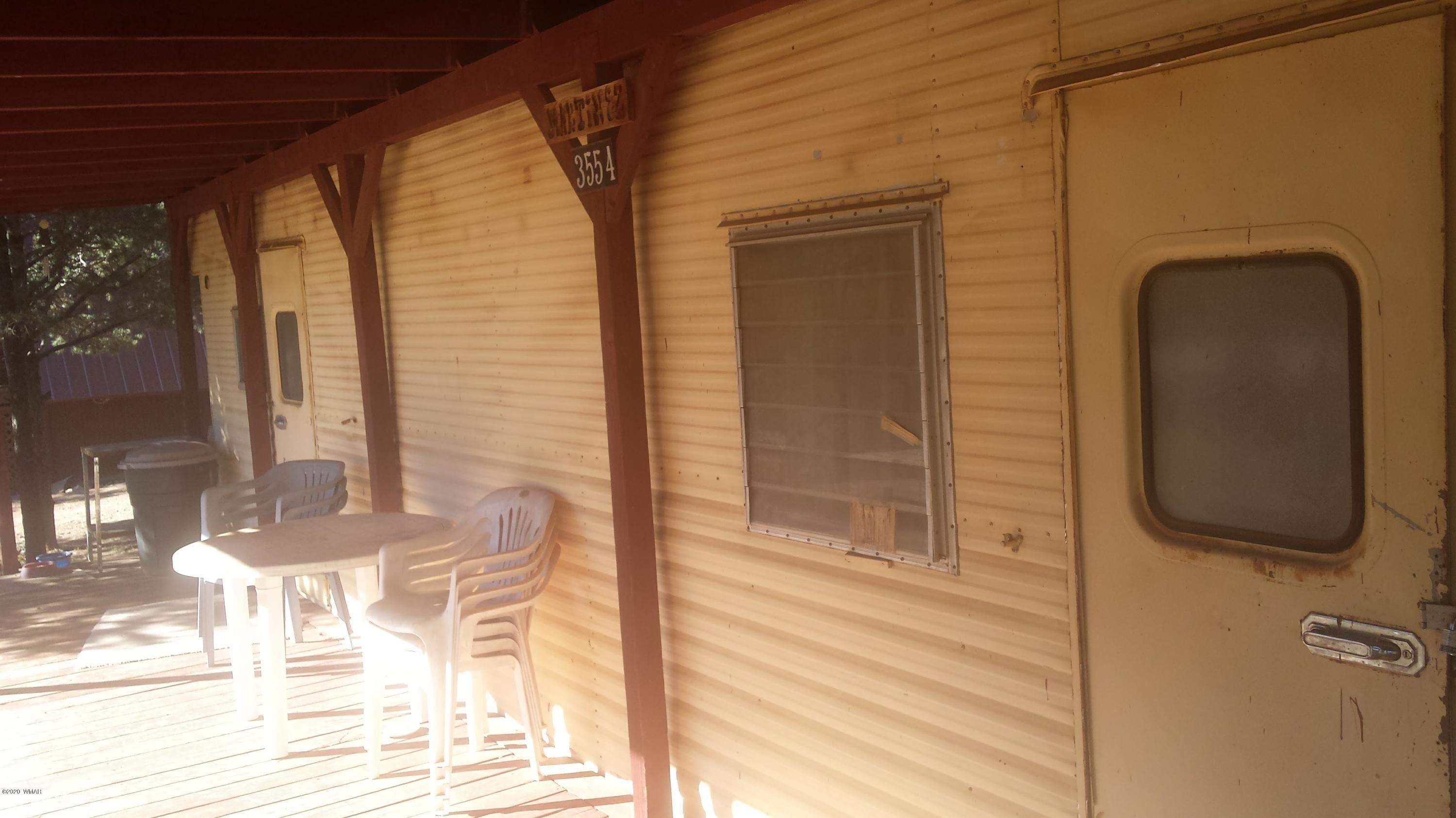 3554 Broken Arrow Road Overgaard, AZ 85933 - Photo 3 of 15 a view of a door of the house
