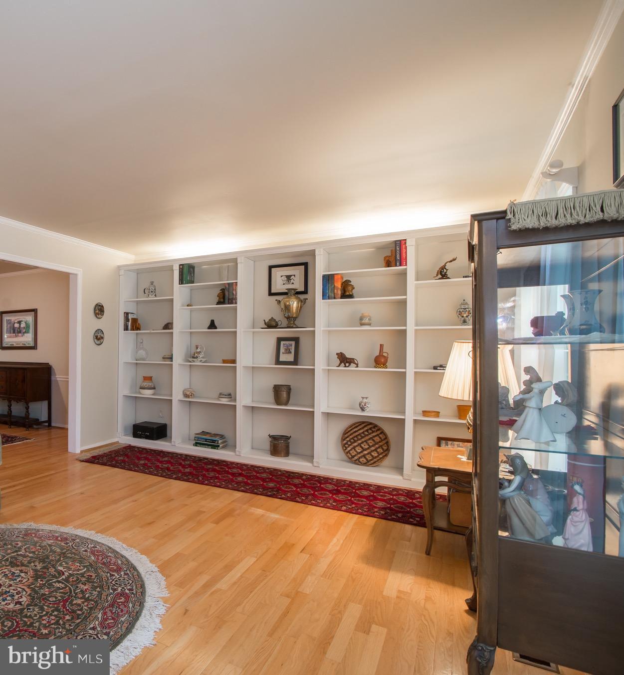 6403 Gregory Court Springfield, VA 22152 - Photo 10 of 26 Living Room with custom bookcases