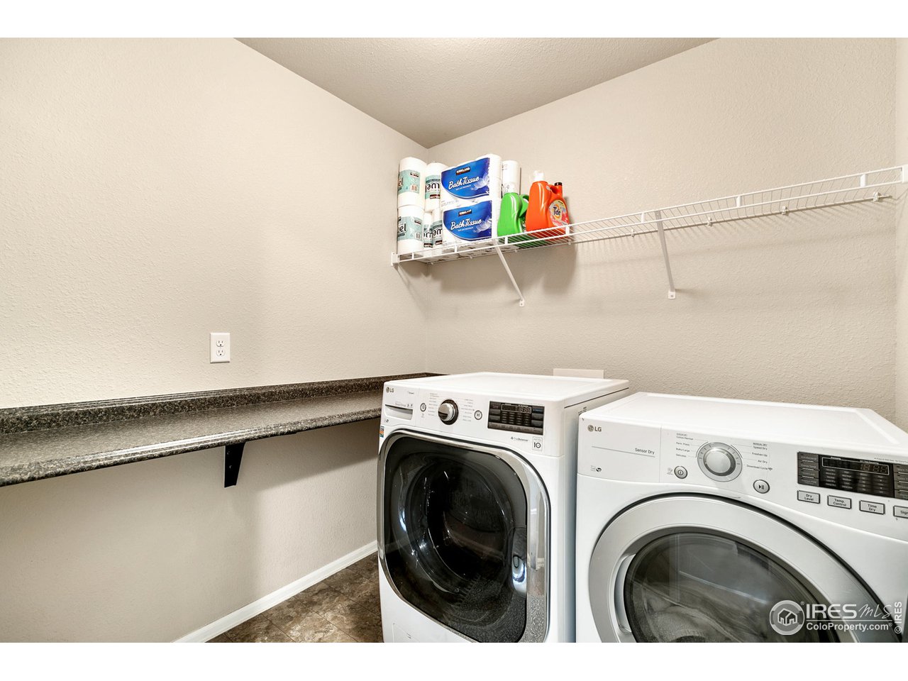 528 El Diente Avenue Severance, CO 80550 - Photo 13 of 19 a utility room with dryer and washer