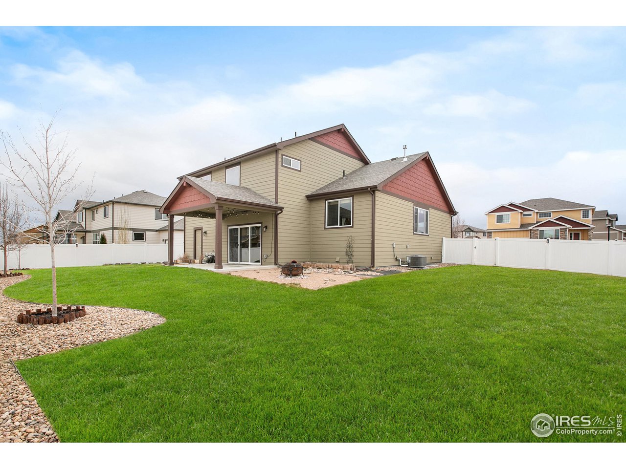 528 El Diente Avenue Severance, CO 80550 - Photo 17 of 19 a view of a house with a yard
