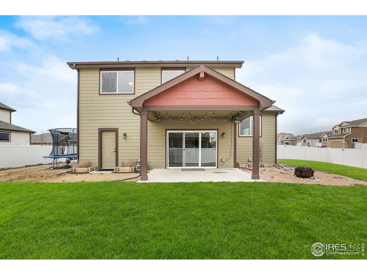 528 El Diente Avenue Severance, CO 80550 - Photo 19 of 19 a front view of a house with a yard and garage