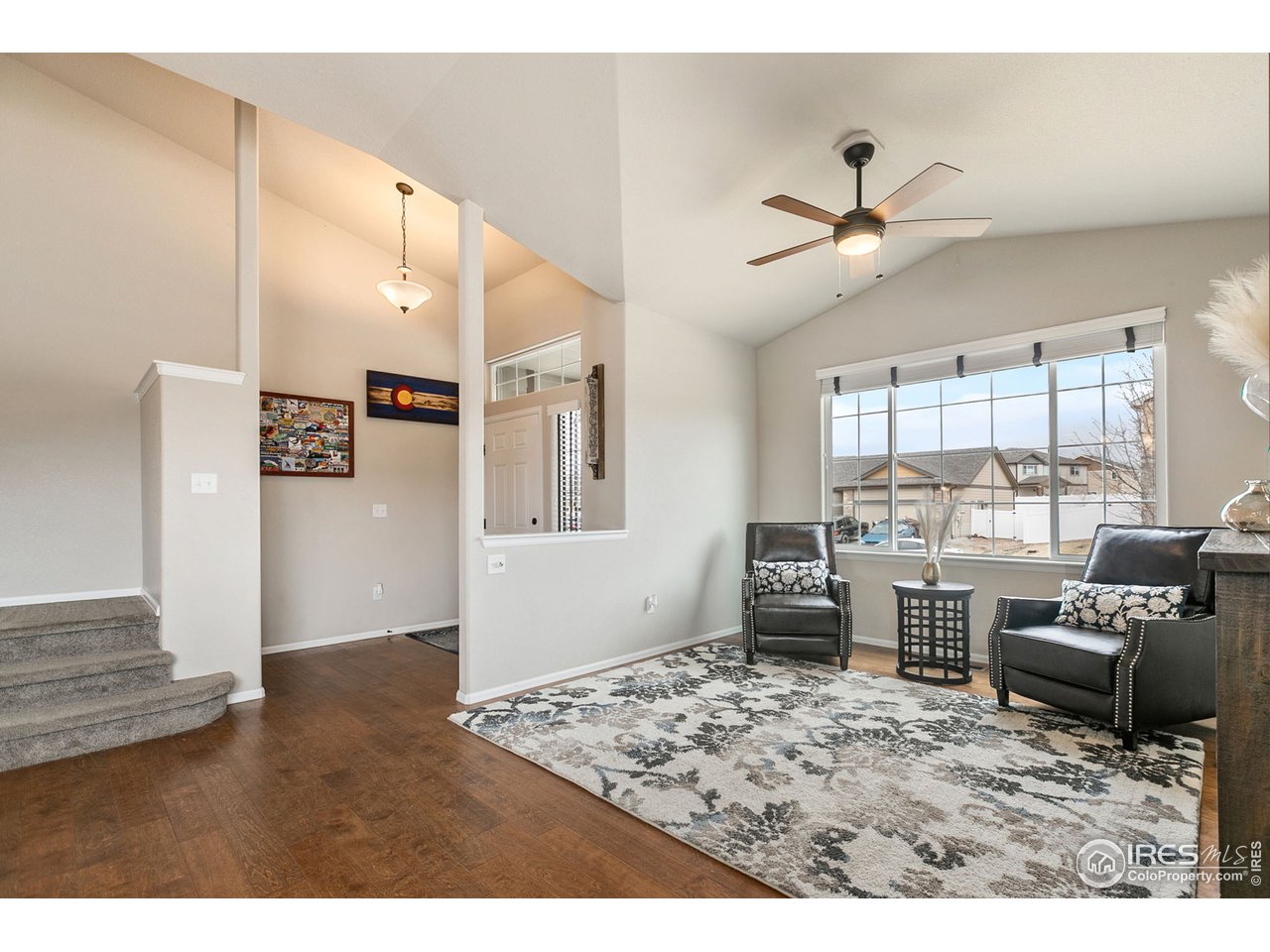 528 El Diente Avenue Severance, CO 80550 - Photo 4 of 19 a living room with furniture and a window