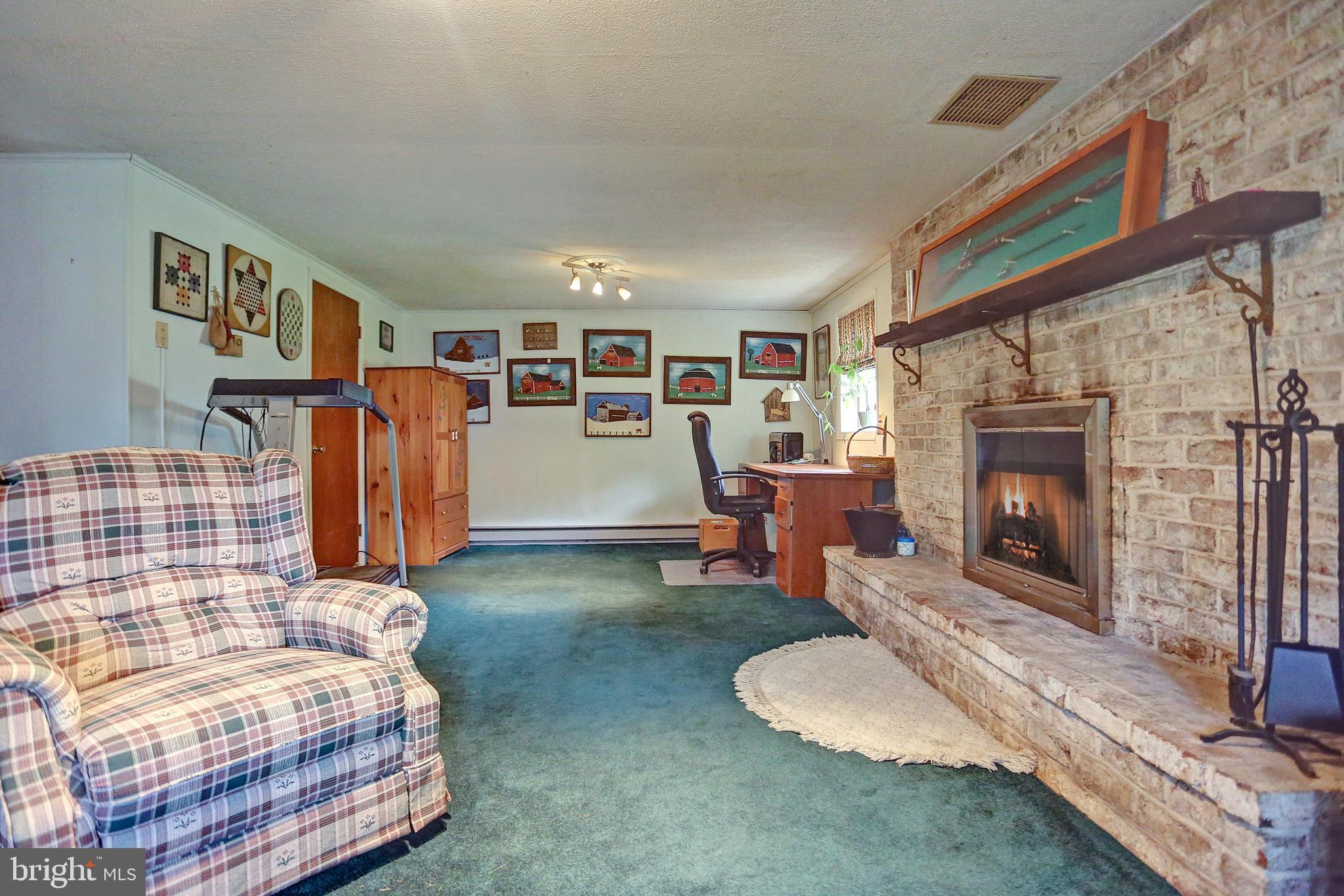 2600 Spring Road Carlisle, PA 17013 - Photo 24 of 32 Family Room with wood burning fireplace