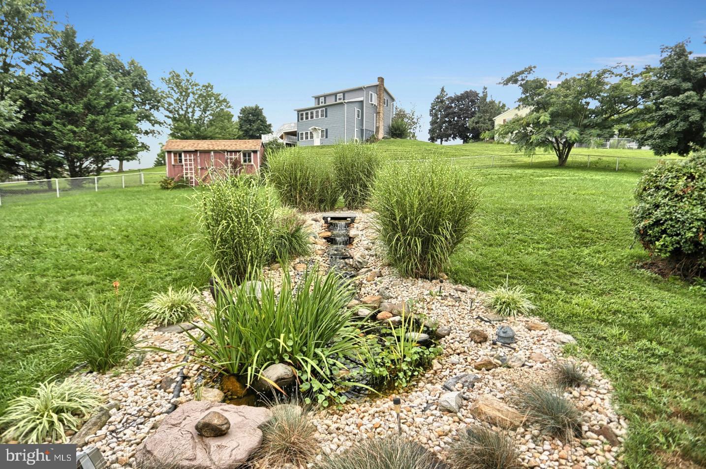 2600 Spring Road Carlisle, PA 17013 - Photo 28 of 32 Waterfall with fish pond
