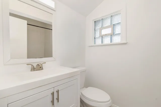 a view of a backyard with swimming pool