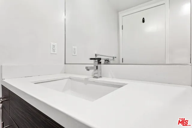 a bathroom with a sink and a bathtub