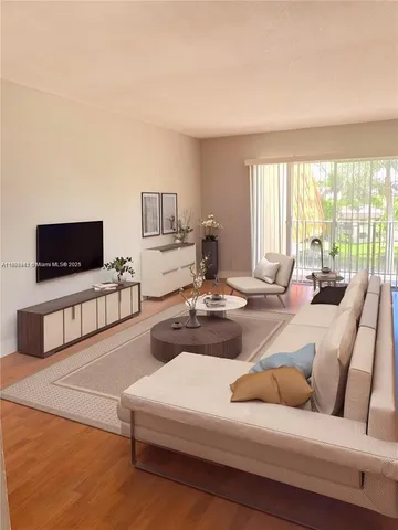 view of a bathroom with wooden floor and a bathroom