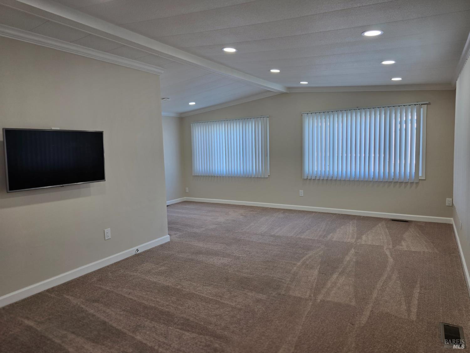 108 Cardinal Way Santa Rosa, CA 95409 - Photo 9 of 20 a view of an empty room with a window and a kitchen