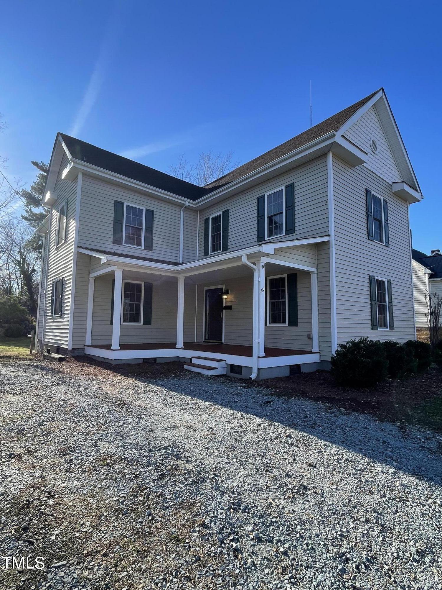 119 Academy Street Roxboro, NC 27573 - Photo 1 of 22 a view of a yard in front of a house