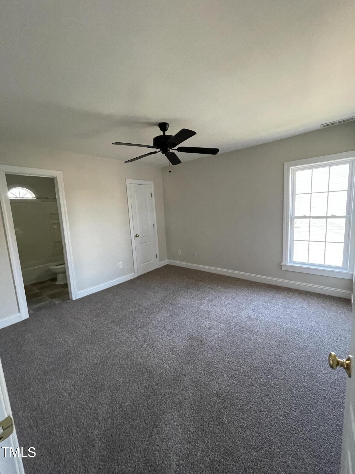 119 Academy Street Roxboro, NC 27573 - Photo 19 of 22 an empty room with a window