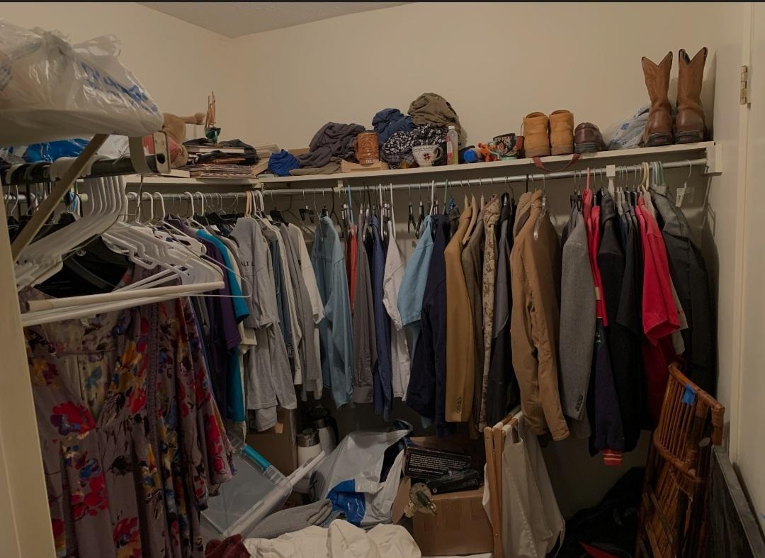 1470 Reddick Mill Road Graceville, FL 32440 - Photo 7 of 11 a view of walk in closet with clothes