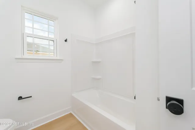 a bathroom with a tub