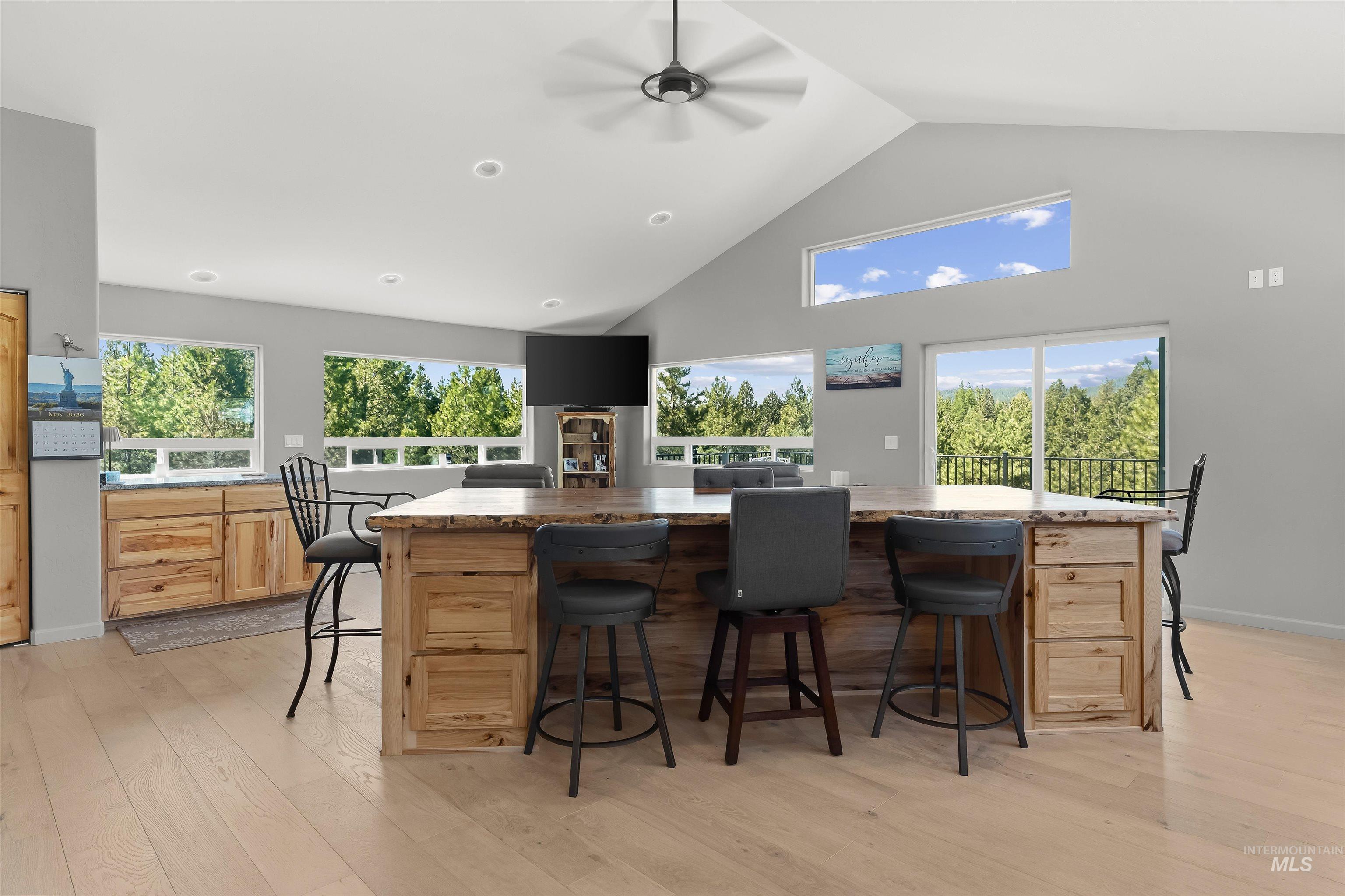 507 Bearlea Road Anatone, WA 99401 - Photo 38 of 47 Open-concept living area featuring a vaulted ceiling and light wood-finish flooring