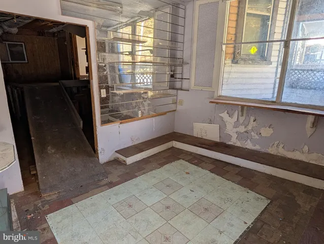 a view of a storage & utility room in front door