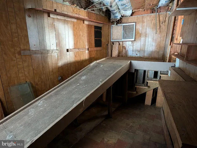 view of living room with furniture and a window