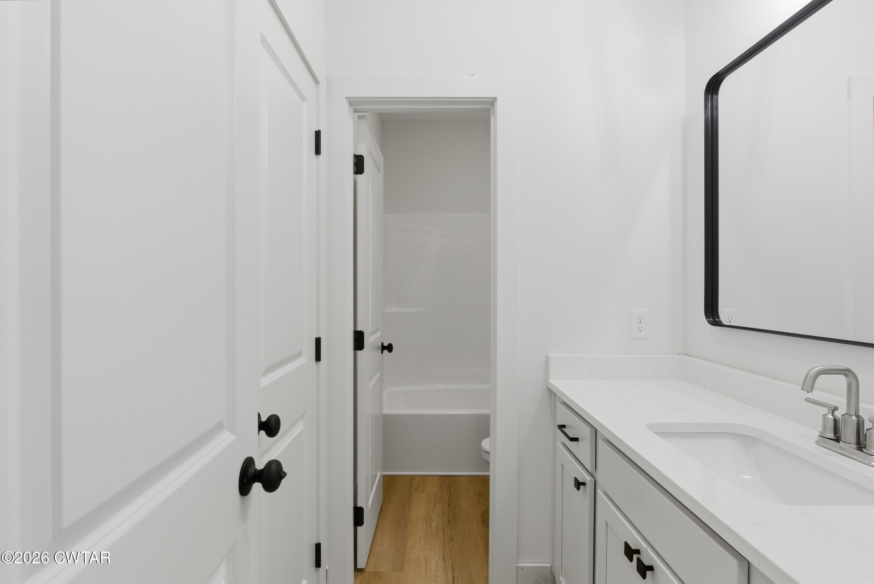 179 Daybreak Loop Medina, TN 38355 - Photo 28 of 32 a bathroom with a sink and a mirror
