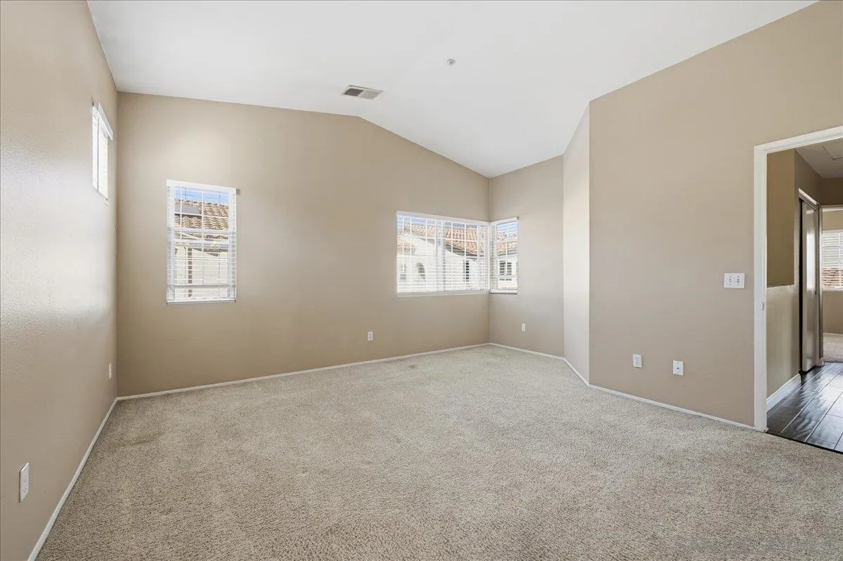 3143 Lamar Court Spring Valley, CA 91977 - Photo 12 of 40 an empty room with windows and closet