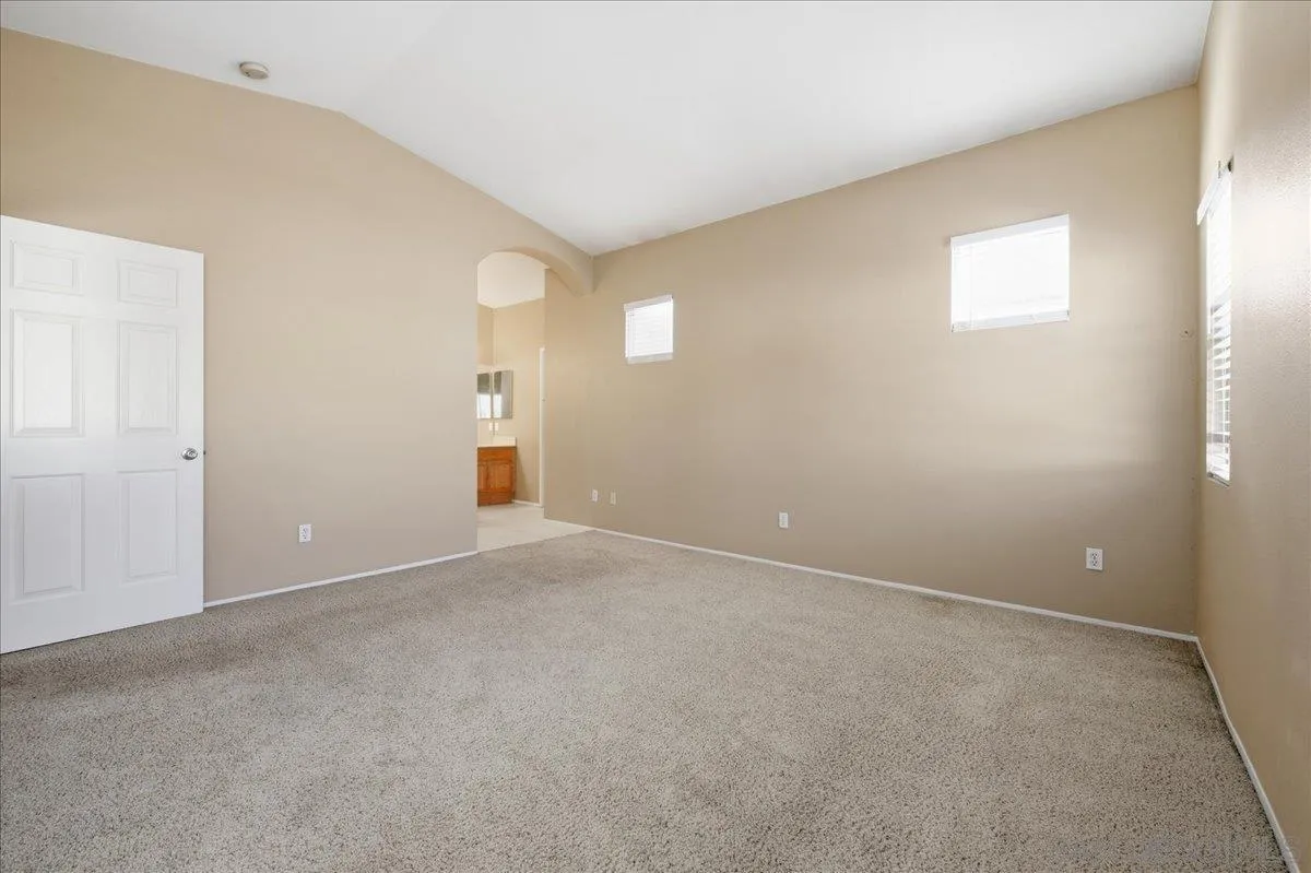 3143 Lamar Court Spring Valley, CA 91977 - Photo 14 of 40 an empty room with windows and closet