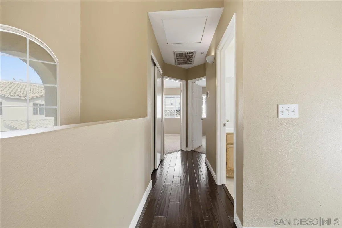 3143 Lamar Court Spring Valley, CA 91977 - Photo 24 of 40 a view of a hallway with wooden floor